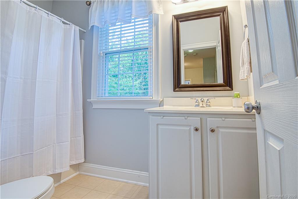 3224 Fifth Baxter Crossing Fort Mill, SC 29708 - Photo 24 of 41 a bathroom with a sink a toilet and a mirror