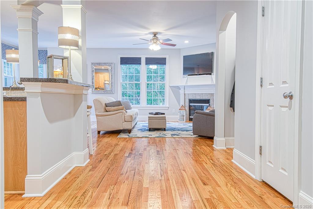 3224 Fifth Baxter Crossing Fort Mill, SC 29708 - Photo 25 of 41 a living room with furniture and a fireplace