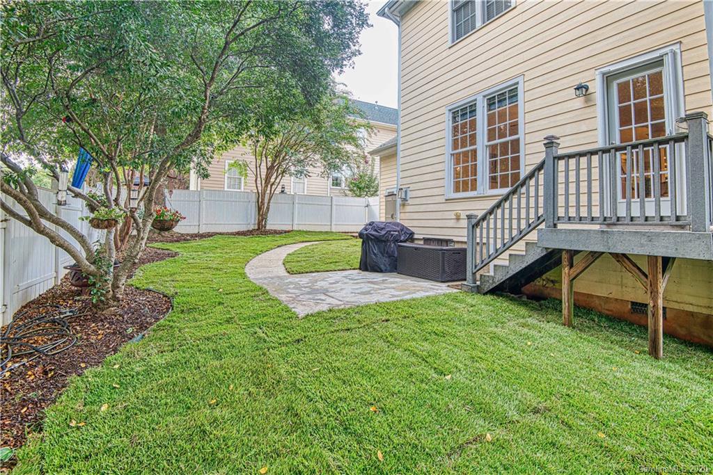 3224 Fifth Baxter Crossing Fort Mill, SC 29708 - Photo 27 of 41 a view of a house with a yard and a patio
