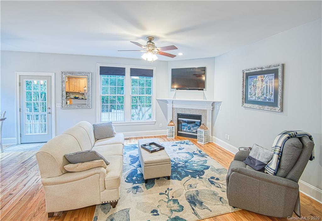3224 Fifth Baxter Crossing Fort Mill, SC 29708 - Photo 10 of 41 a living room with furniture and a fireplace
