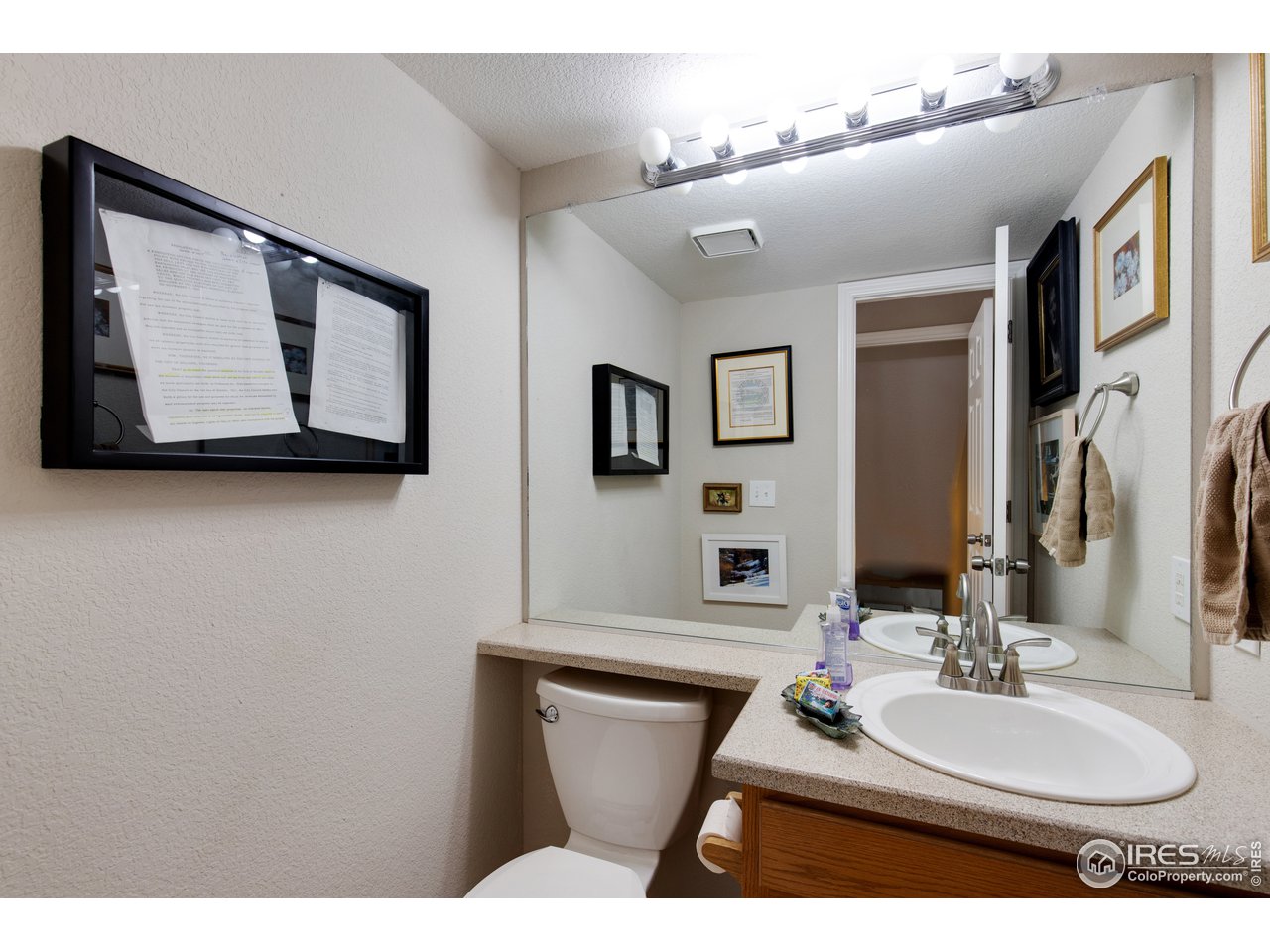 5635 Quarry Court Boulder, CO 80301 - Photo 21 of 28 a bathroom with a sink vanity and mirror