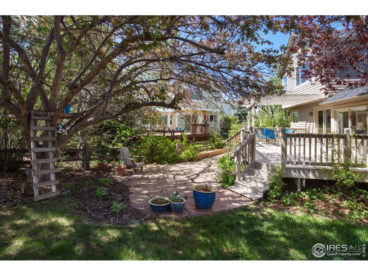 5635 Quarry Court Boulder, CO 80301 - Photo 28 of 28 a view of a house with backyard and sitting area