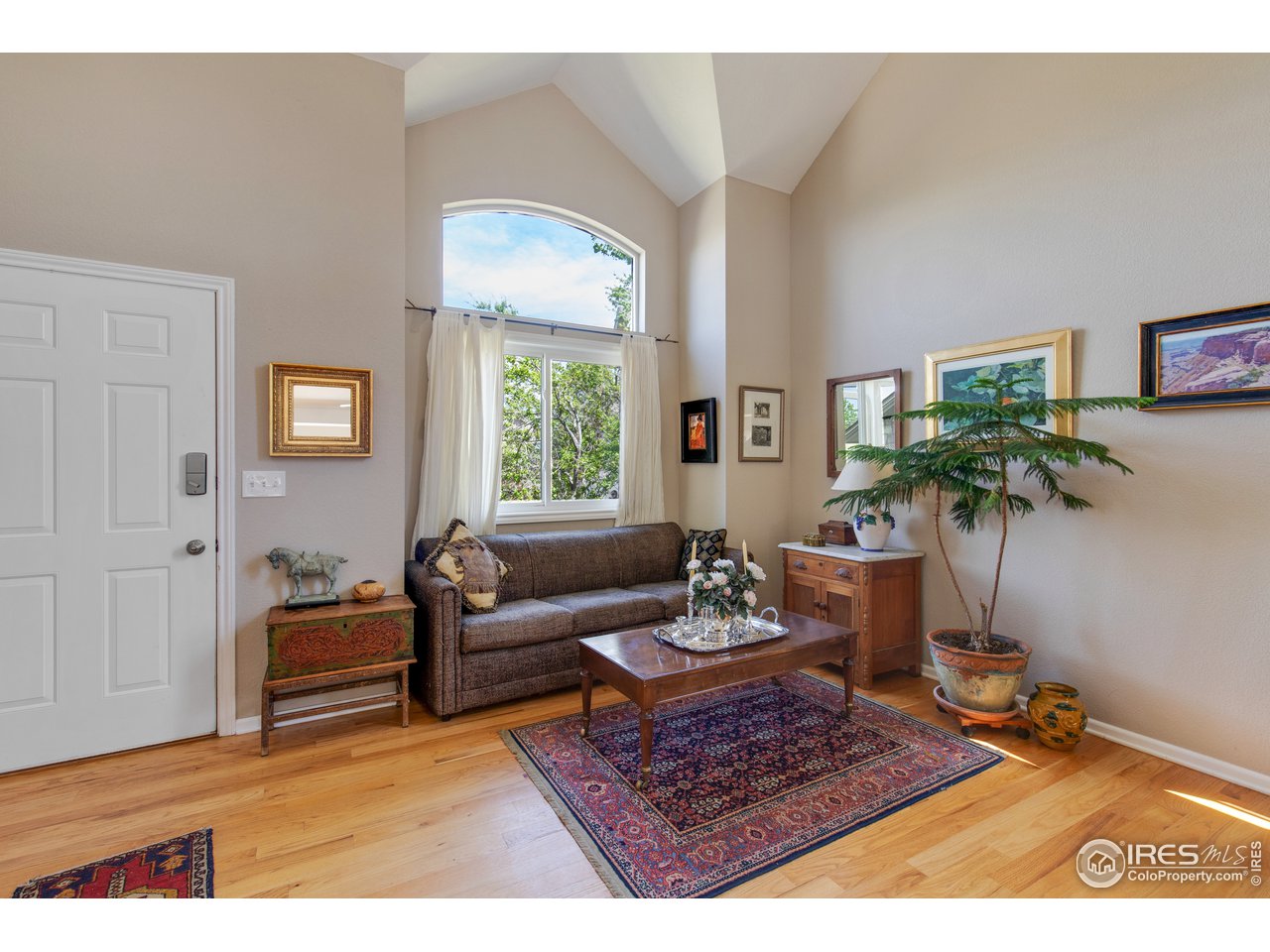 5635 Quarry Court Boulder, CO 80301 - Photo 5 of 28 a living room with furniture potted plant and window