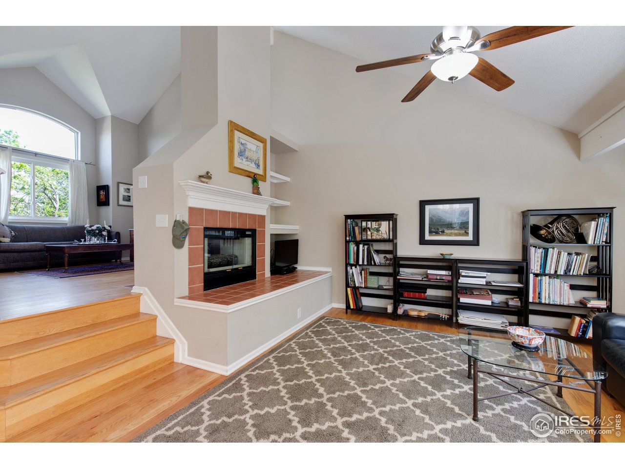 5635 Quarry Court Boulder, CO 80301 - Photo 6 of 28 a living room with furniture and a fireplace