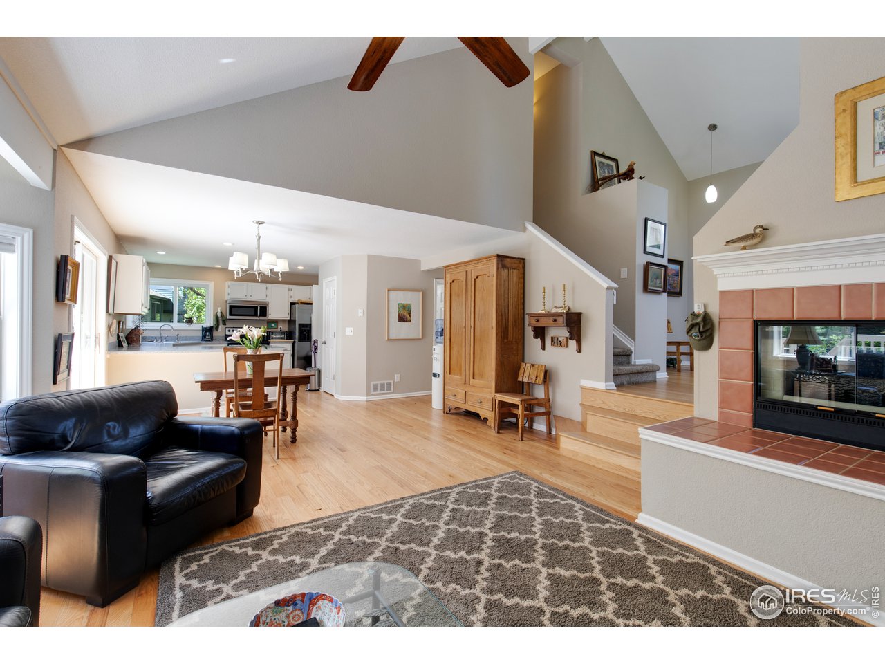 5635 Quarry Court Boulder, CO 80301 - Photo 7 of 28 a living room with furniture and a flat screen tv