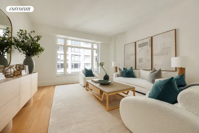 a spacious bedroom with a bed and a couch