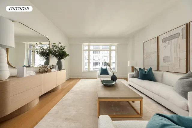a living room with furniture and a potted plant