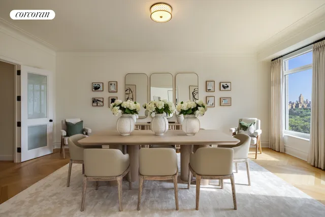 a living room with furniture a rug a lamp and a large window