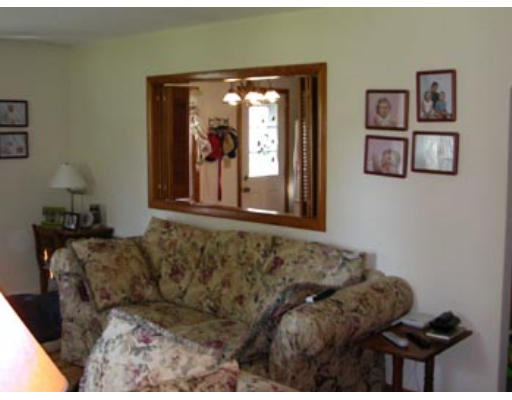 245 Perry Hill Road Acushnet, MA 02743 - Photo 6 of 20 a living room with furniture and a window