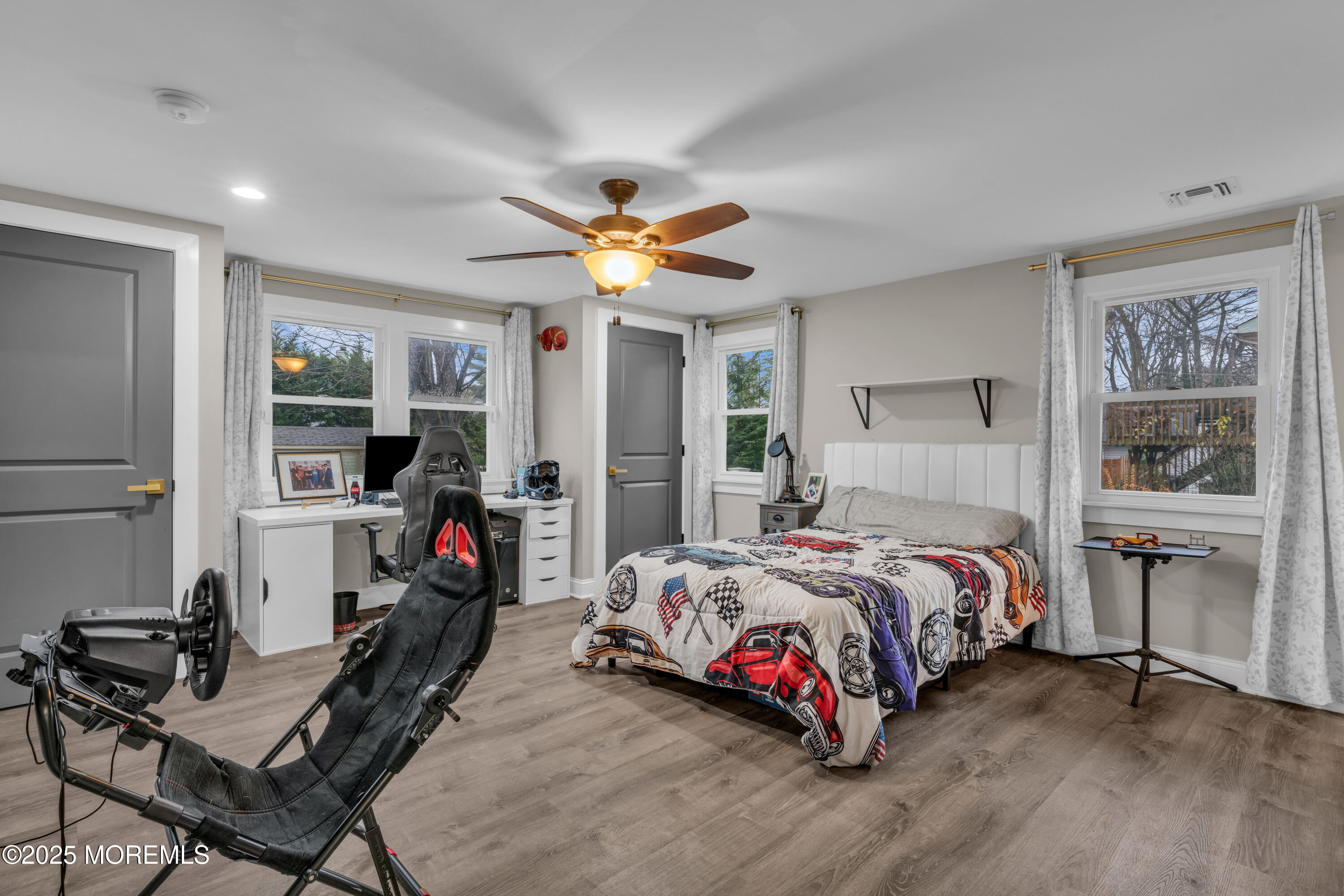 91 Sycamore Avenue Little Silver, NJ 07739 - Photo 25 of 52 a bedroom with a bed and furniture