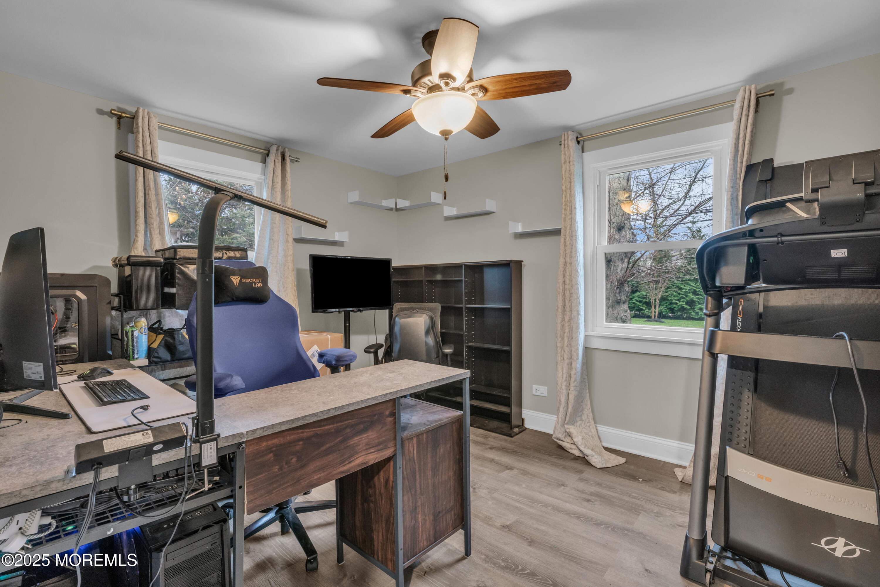 91 Sycamore Avenue Little Silver, NJ 07739 - Photo 28 of 52 a living room with furniture fireplace and window