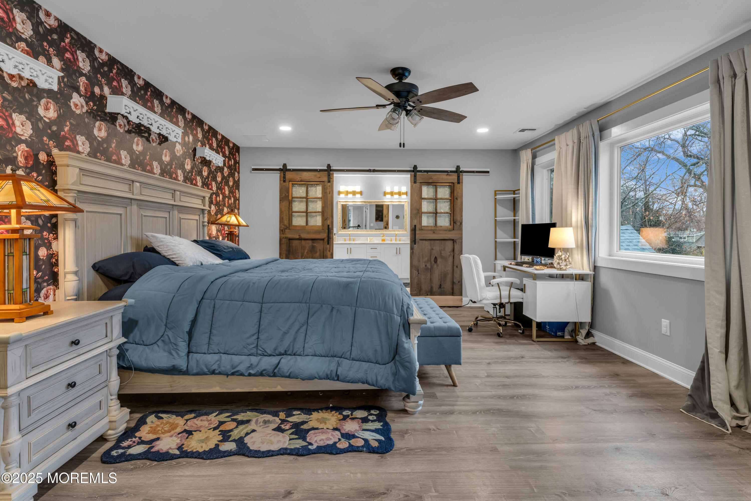 91 Sycamore Avenue Little Silver, NJ 07739 - Photo 30 of 52 a bedroom with a bed and wooden floor