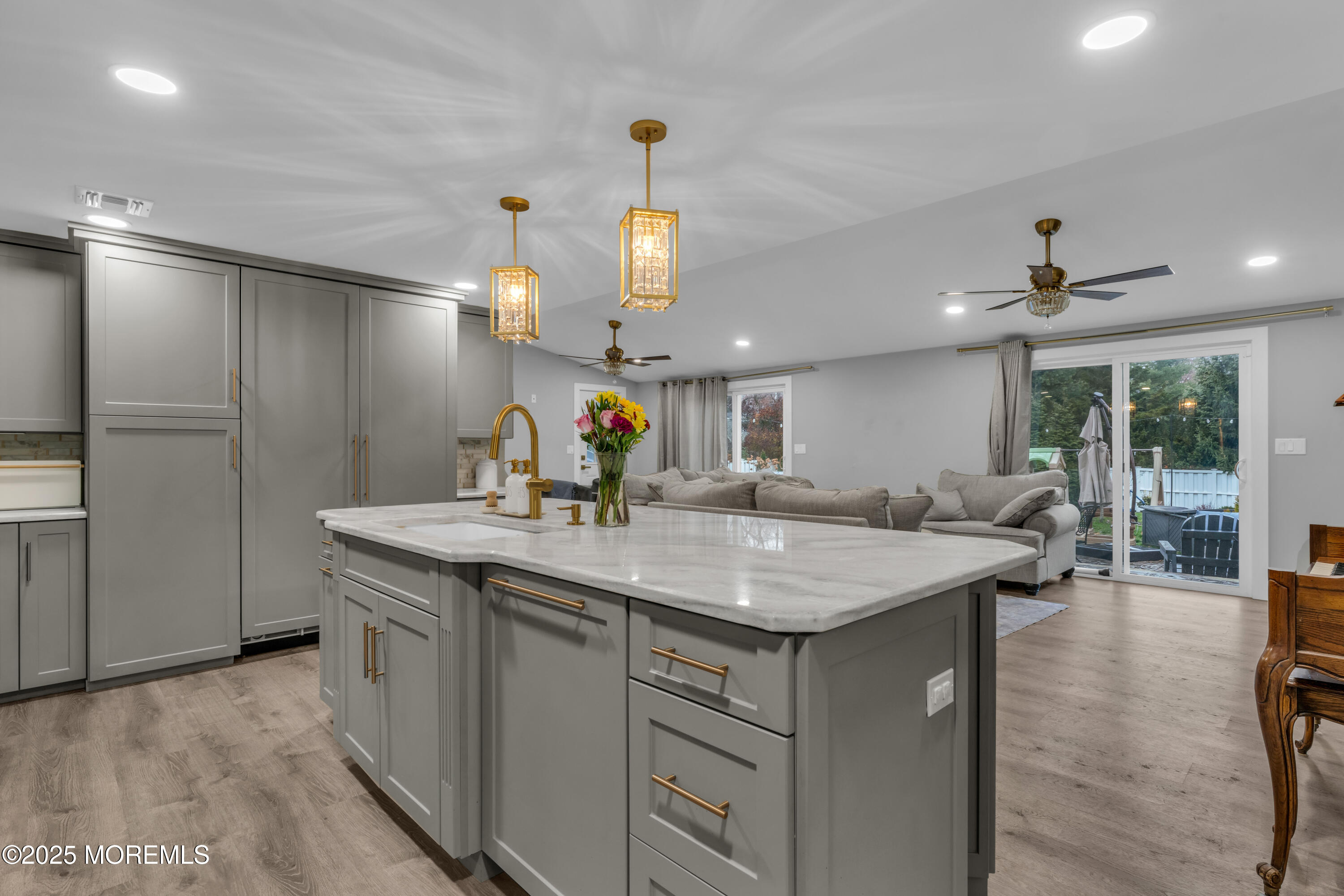 91 Sycamore Avenue Little Silver, NJ 07739 - Photo 35 of 52 a kitchen with a sink a counter top space and stainless steel appliances