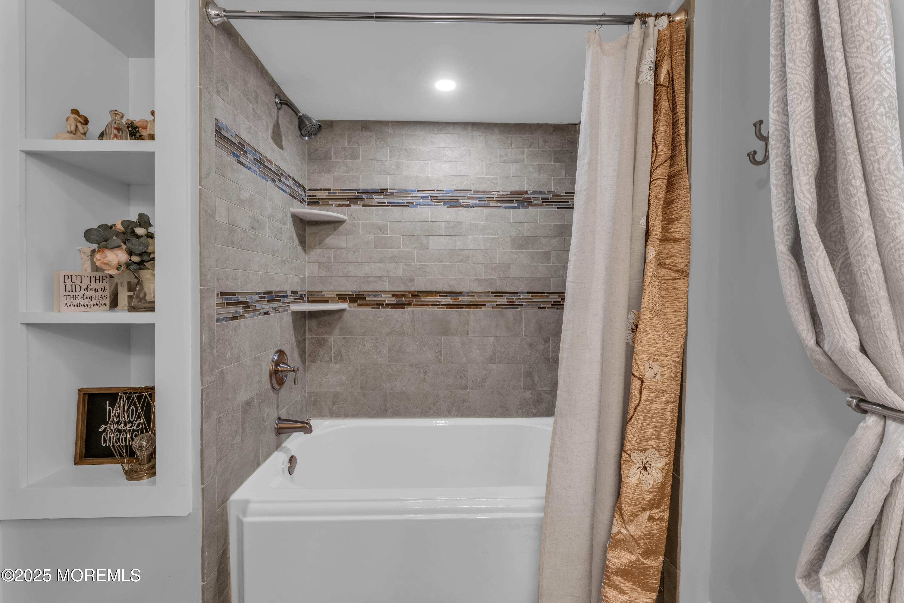 91 Sycamore Avenue Little Silver, NJ 07739 - Photo 41 of 52 a bathroom with a bathtub and a shower