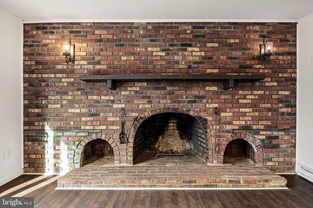 a view of a fireplace with a door