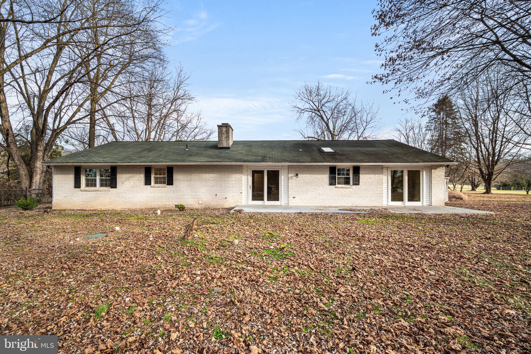 13 Keller Road Cochranville, PA 19330 - Photo 40 of 41 a front view of a house with a garden