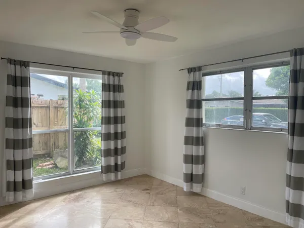 an empty room with windows