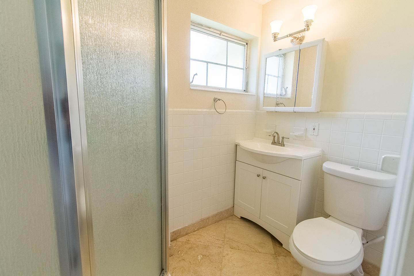 927 West Royal Palm Road Boca Raton, FL 33486 - Photo 19 of 31 a bathroom with a toilet a sink a vanity and mirror