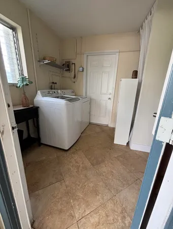 a room with a washer and dryer