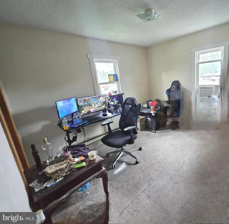 a room with furniture and a window