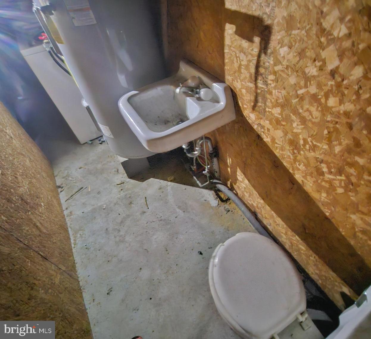 451 Harmison Place Romney, WV 26757 - Photo 37 of 61 toilet & sink/garage