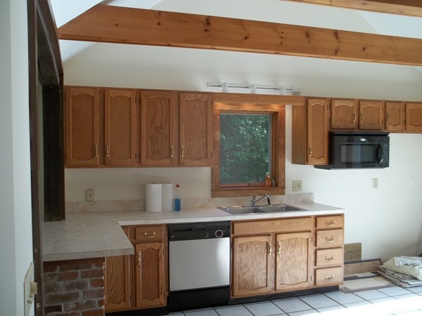250 Ward Hill Road Phillipston, MA 01331 - Photo 5 of 14 a kitchen with stainless steel appliances granite countertop a sink stove and microwave