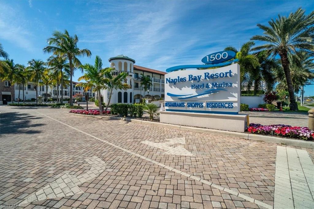 965 Sandpiper Street, Unit J107 Naples, FL 34102 - Photo 27 of 30 a sign board with parking space