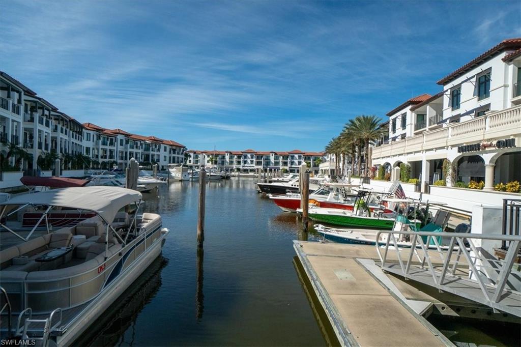 965 Sandpiper Street, Unit J107 Naples, FL 34102 - Photo 29 of 30 a view of a lake from a balcony