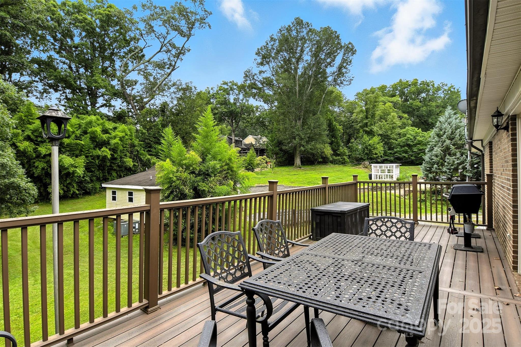 530 5th Street Northwest Hickory, NC 28601 - Photo 14 of 48 a view of a deck with two chair and a table