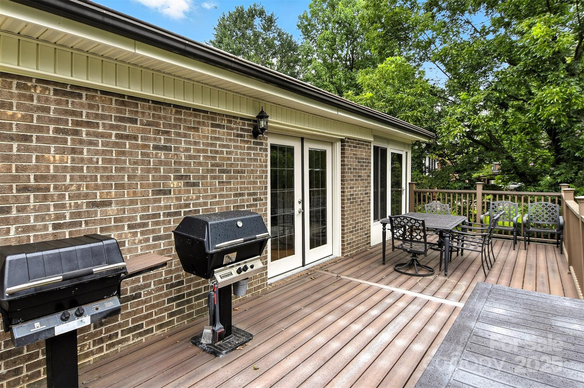 530 5th Street Northwest Hickory, NC 28601 - Photo 15 of 48 a view of a balcony with two chairs and wooden floor