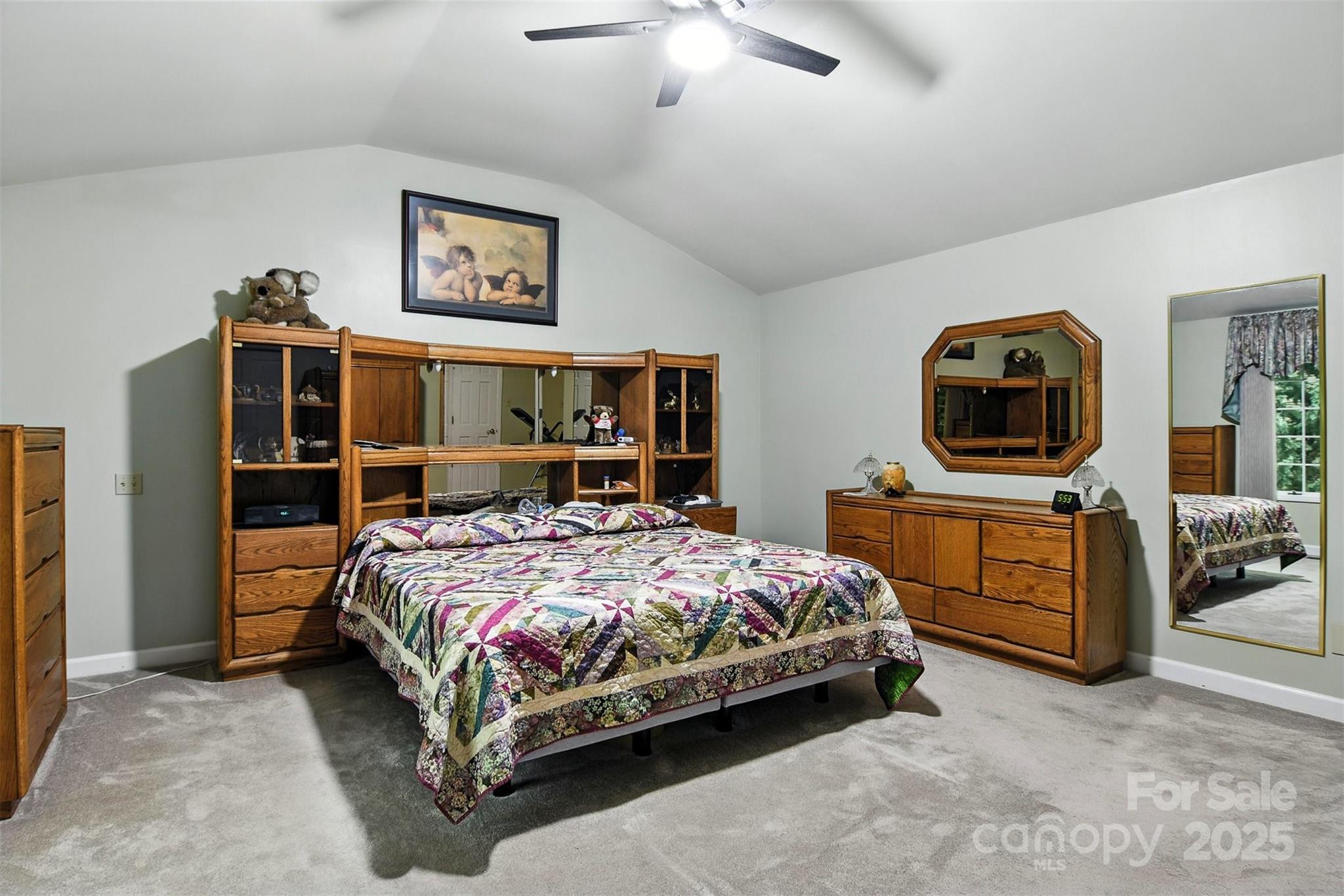 530 5th Street Northwest Hickory, NC 28601 - Photo 17 of 48 a bedroom with a bed and a tv on the dresser