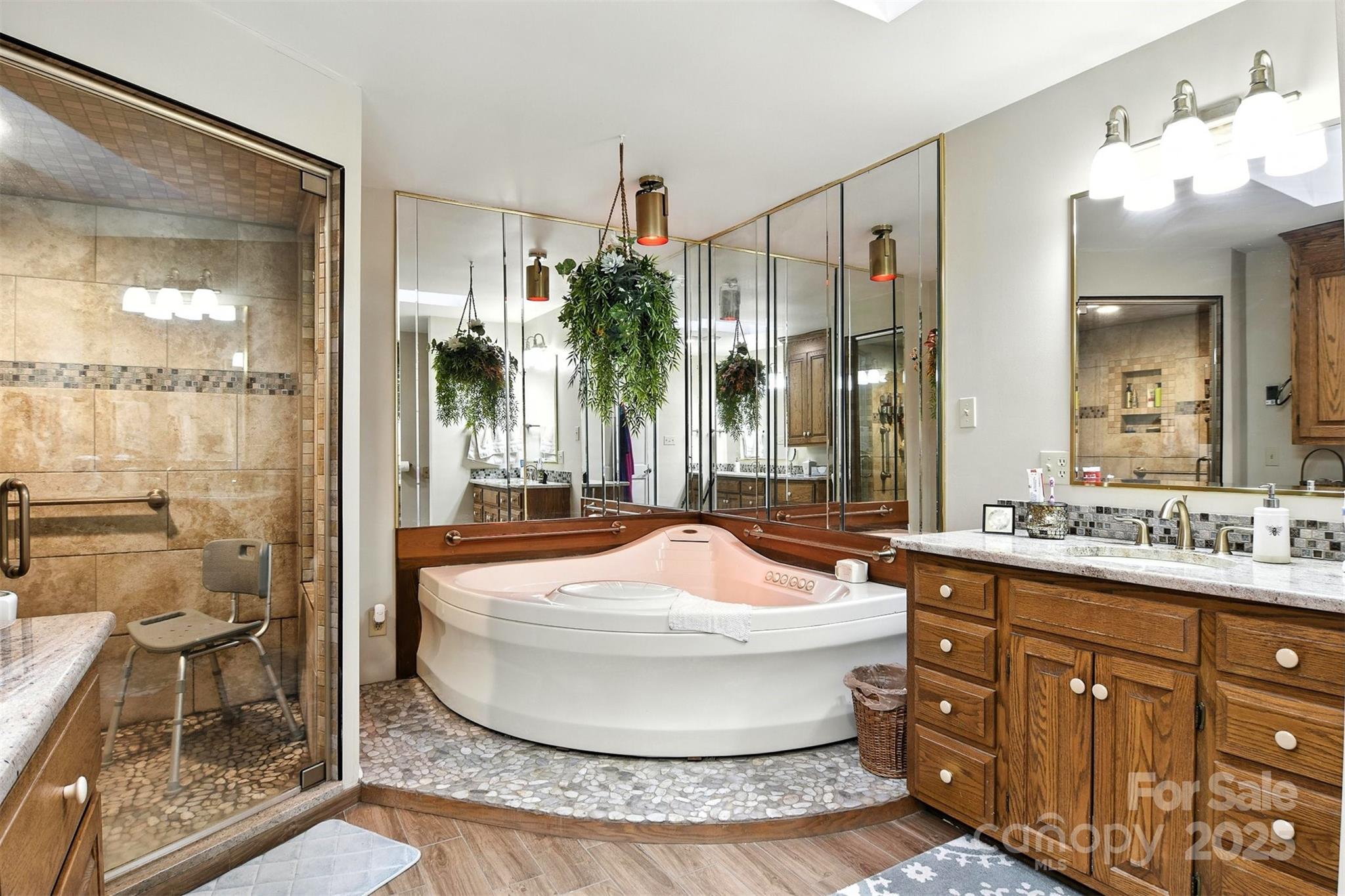 530 5th Street Northwest Hickory, NC 28601 - Photo 19 of 48 a bathroom with a tub sink and mirror