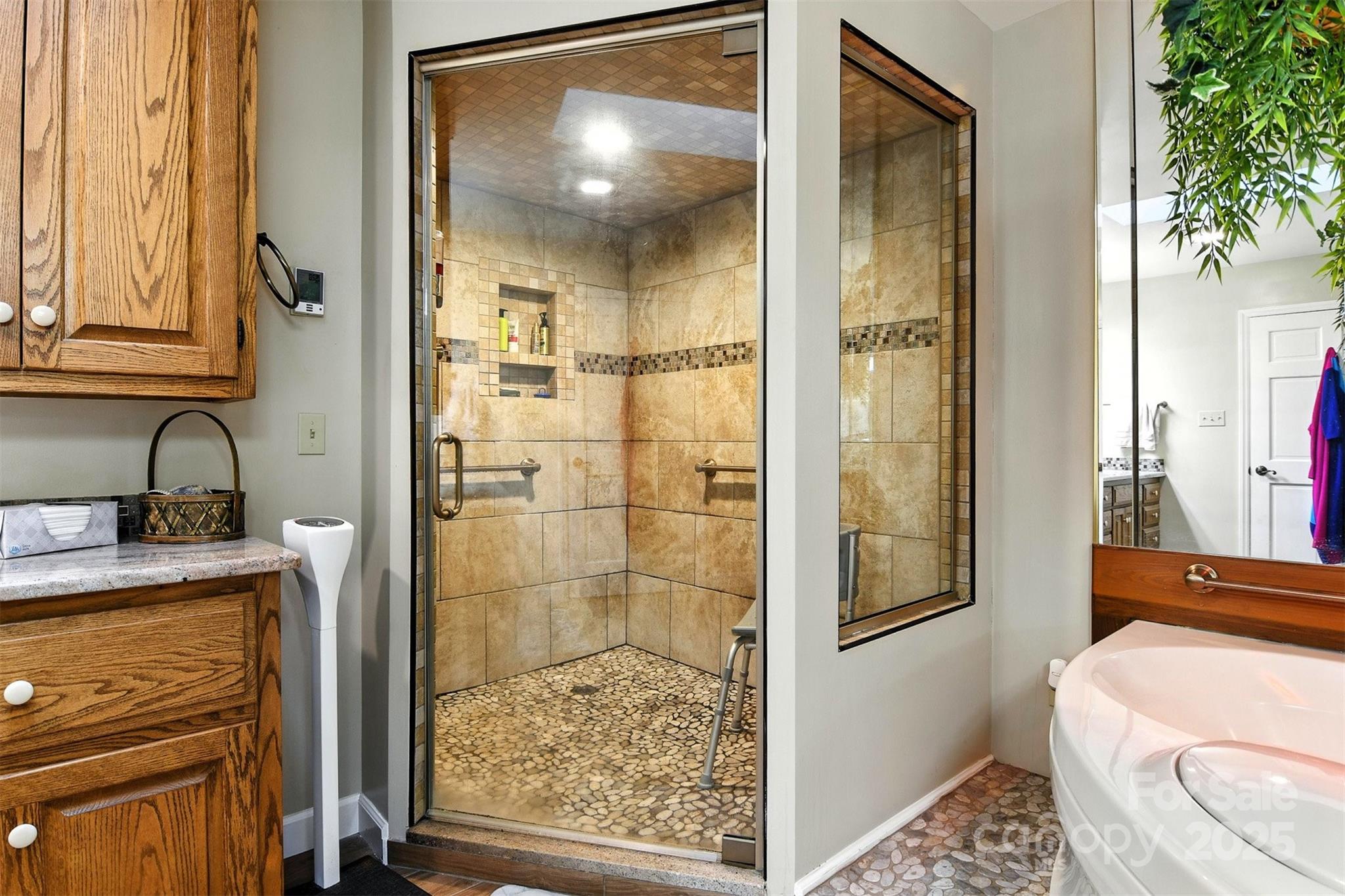 530 5th Street Northwest Hickory, NC 28601 - Photo 21 of 48 a bathroom with a sink a toilet and shower