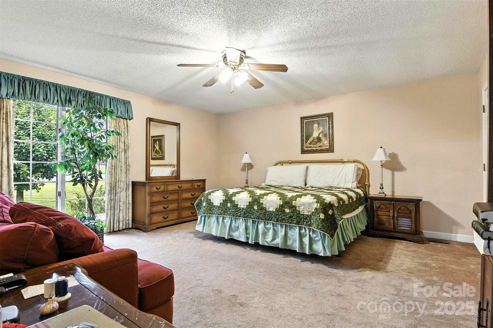 530 5th Street Northwest Hickory, NC 28601 - Photo 22 of 48 a bedroom with a bed couch and window