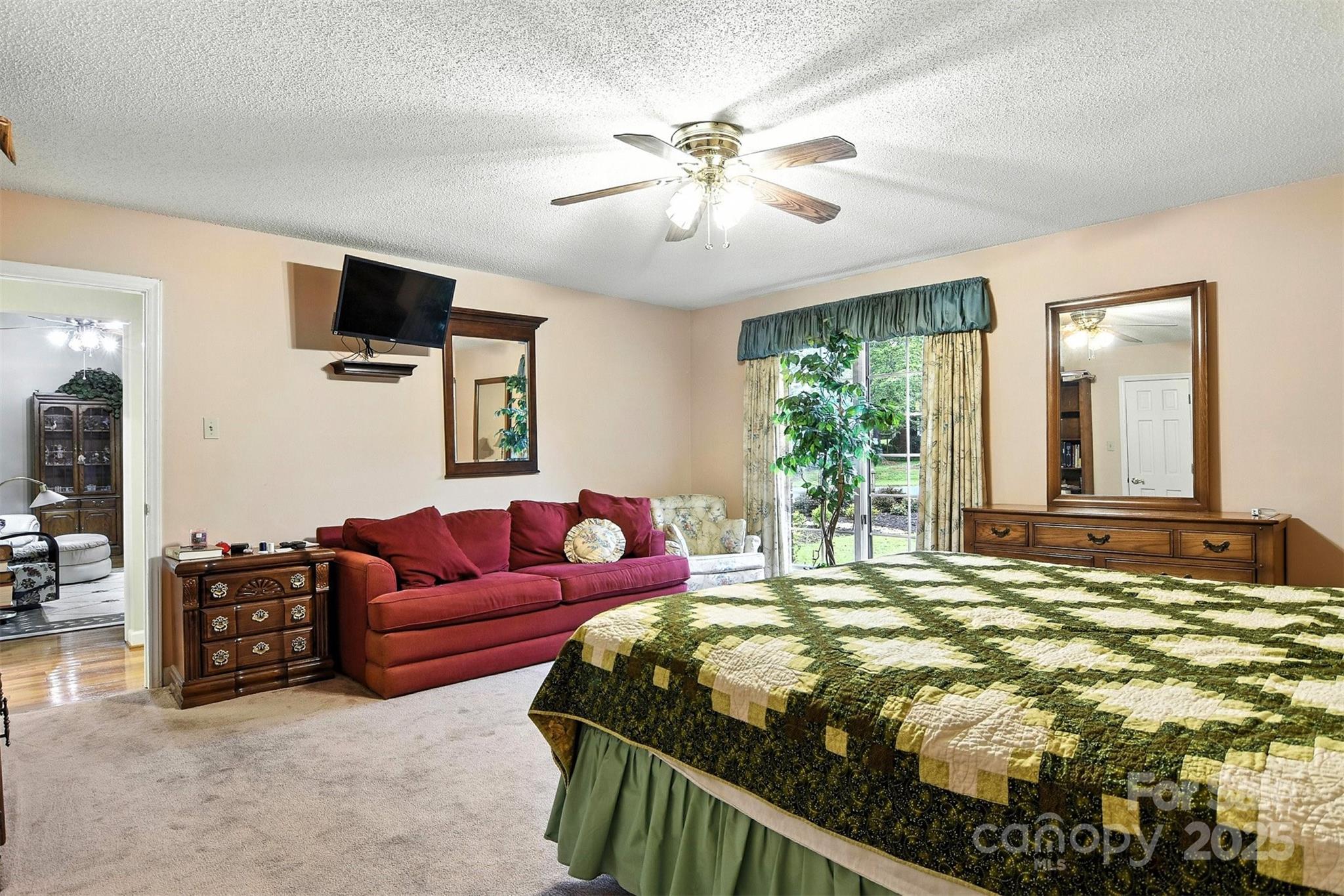 530 5th Street Northwest Hickory, NC 28601 - Photo 23 of 48 a bedroom with a bed couch and window
