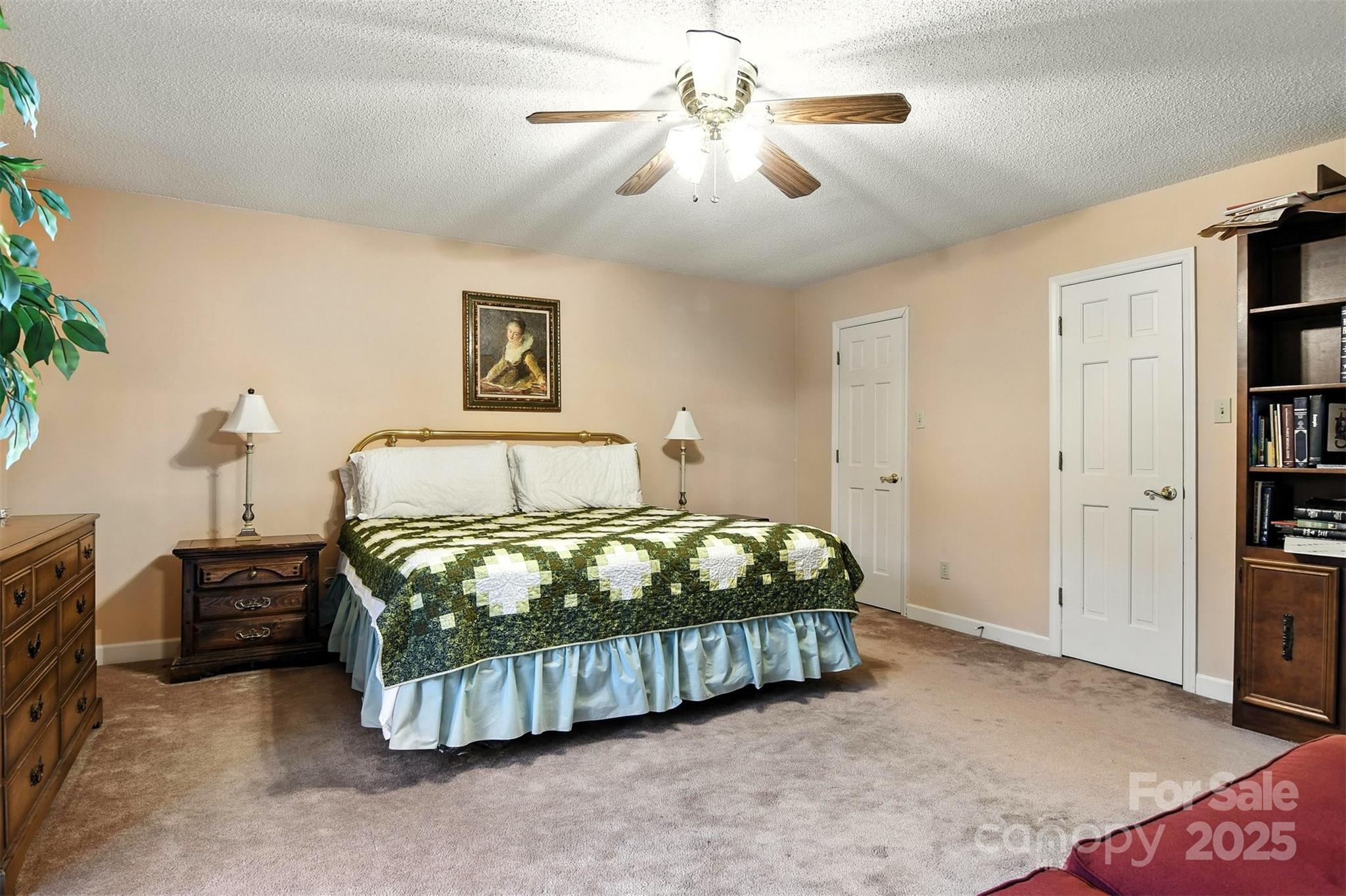 530 5th Street Northwest Hickory, NC 28601 - Photo 24 of 48 a bedroom with a bed and a chandelier