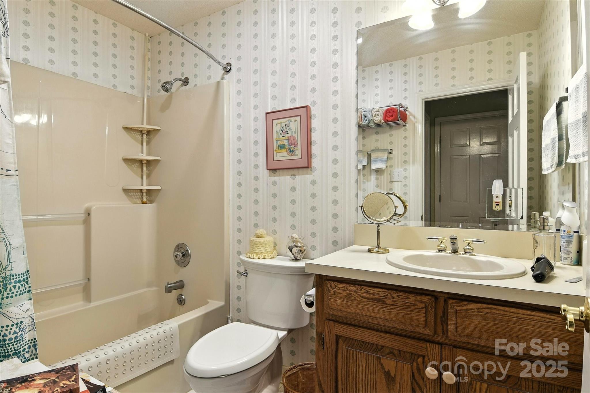 530 5th Street Northwest Hickory, NC 28601 - Photo 27 of 48 a bathroom with a sink a toilet and shower