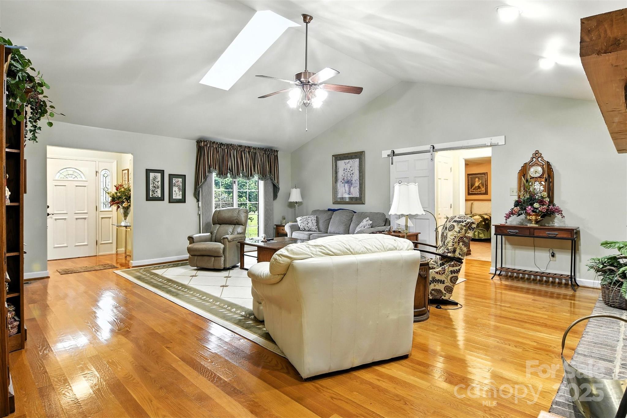 530 5th Street Northwest Hickory, NC 28601 - Photo 3 of 48 a living room with fireplace furniture and a chandelier