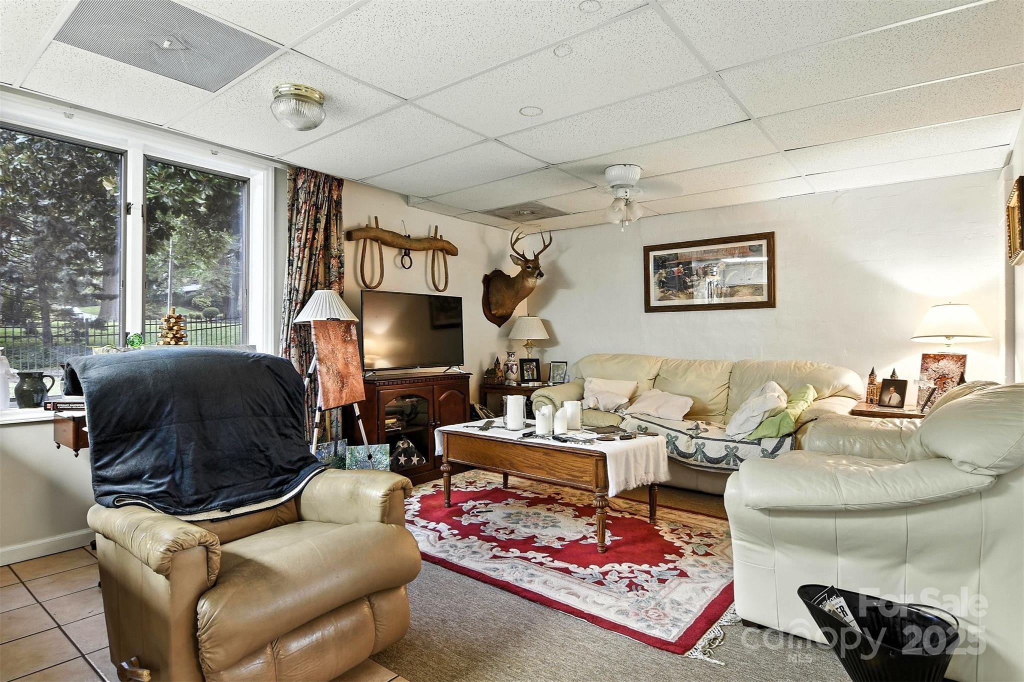 530 5th Street Northwest Hickory, NC 28601 - Photo 33 of 48 a living room with furniture and a floor to ceiling window