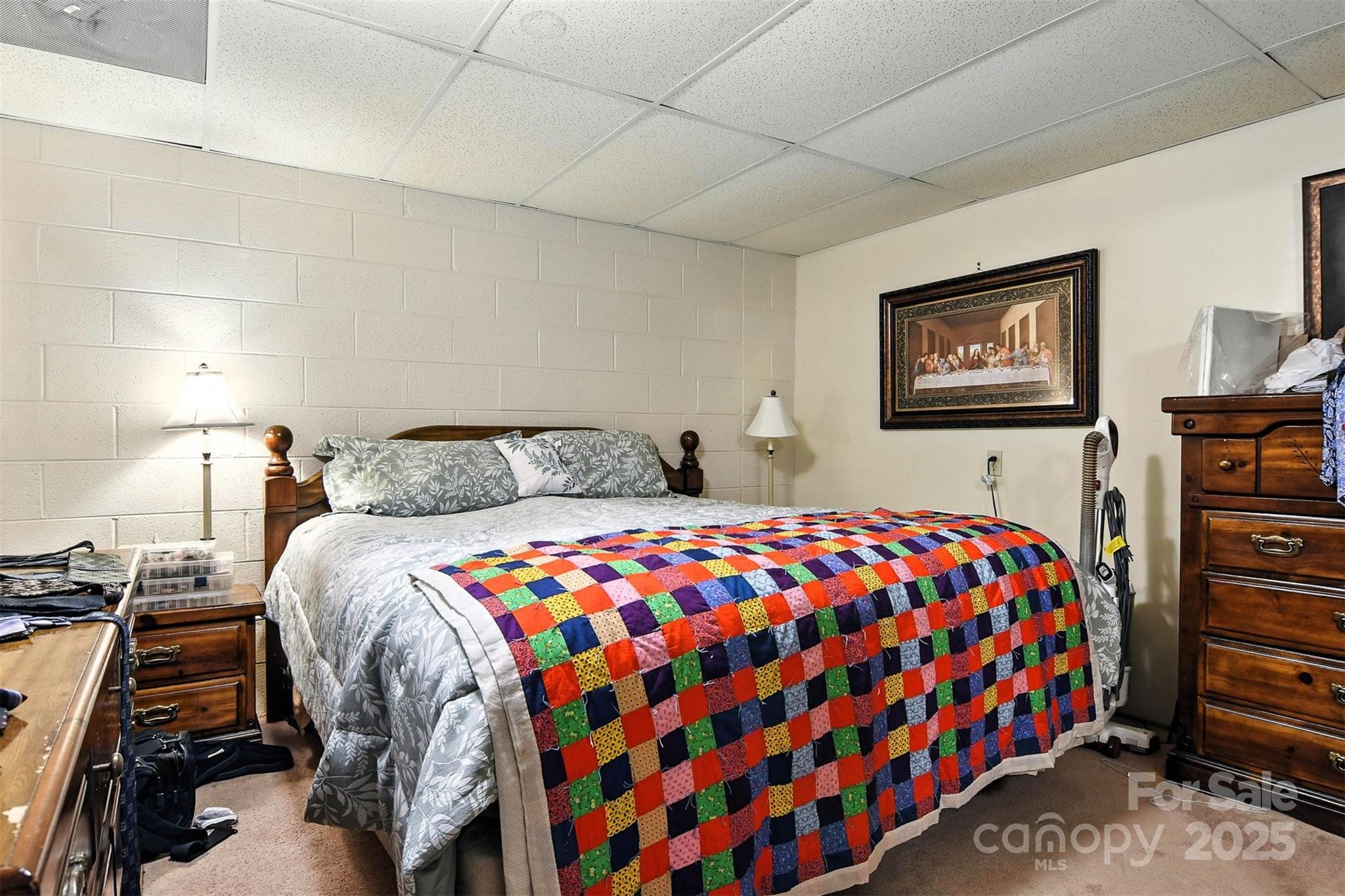 530 5th Street Northwest Hickory, NC 28601 - Photo 35 of 48 a bedroom with a bed and dresser