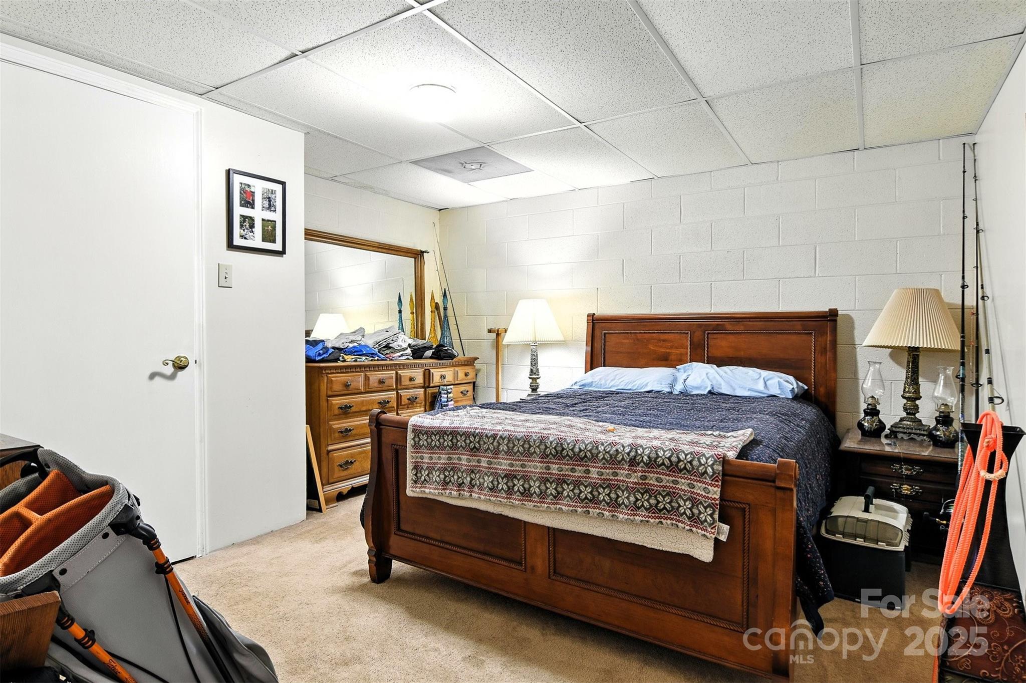 530 5th Street Northwest Hickory, NC 28601 - Photo 36 of 48 a bedroom with a bed and wooden floor