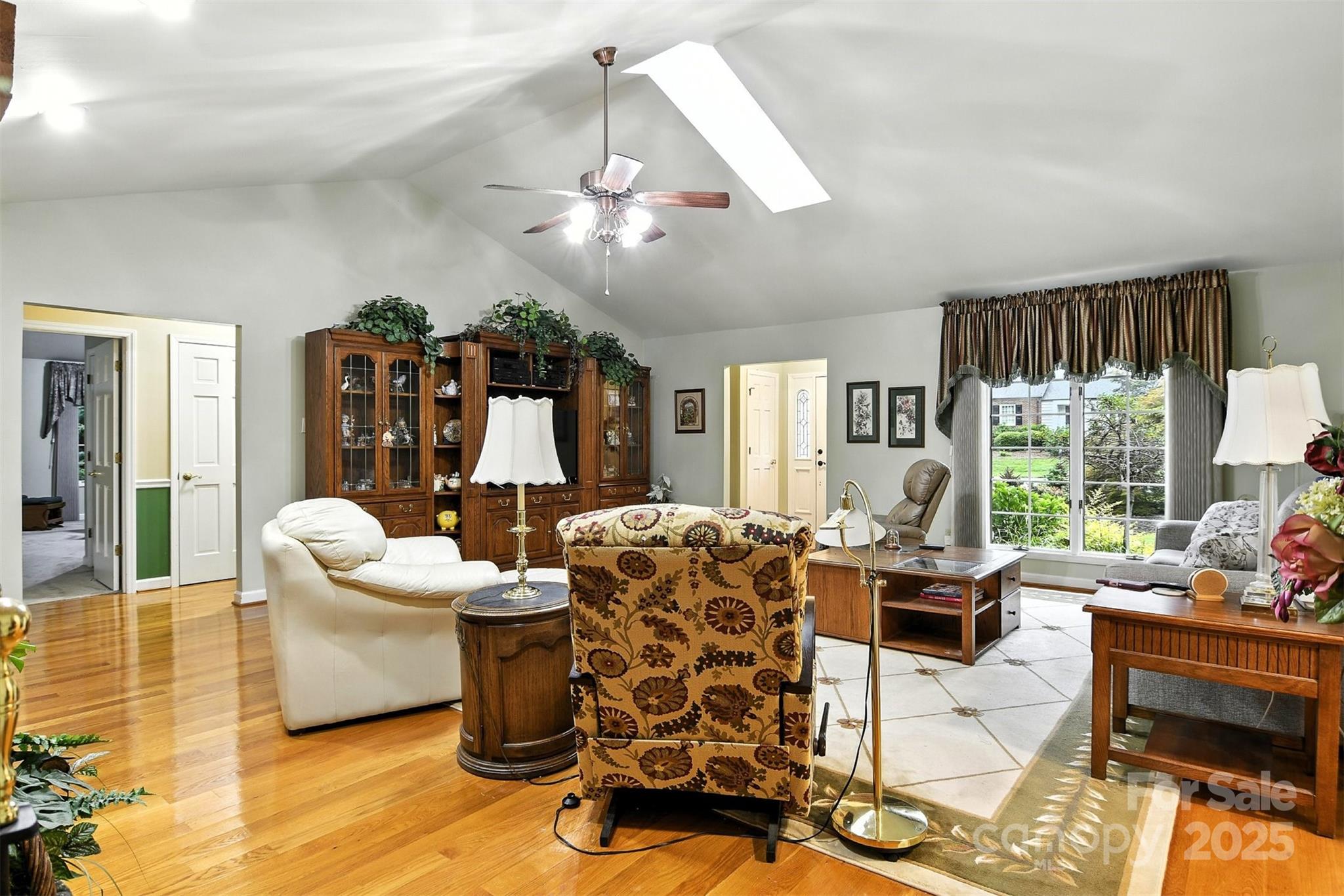 530 5th Street Northwest Hickory, NC 28601 - Photo 4 of 48 a living room with furniture chandelier and large windows