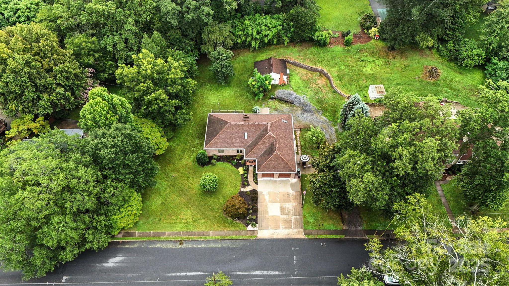 530 5th Street Northwest Hickory, NC 28601 - Photo 47 of 48 an aerial view of residential house with outdoor space and trees all around