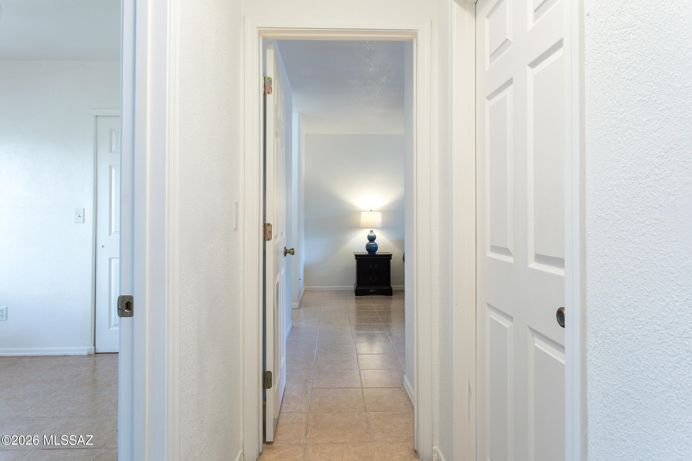 1081 Paseo Freno Rio Rico, AZ 85648 - Photo 19 of 46 a view of a bathroom from a hallway