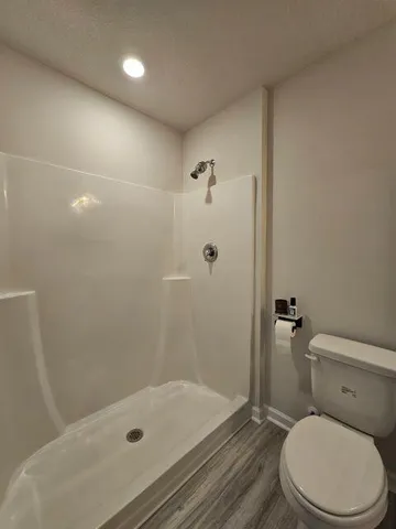 a bathroom with a double vanity sink and mirror