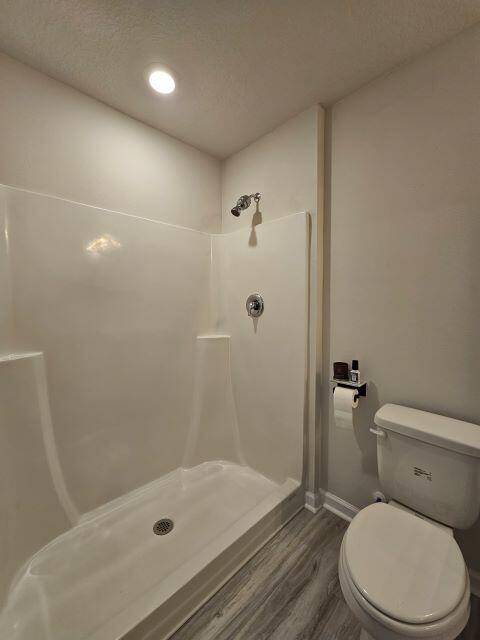 327 Flounder Street Crestview, FL 32539 - Photo 20 of 26 a bathroom with a toilet and shower