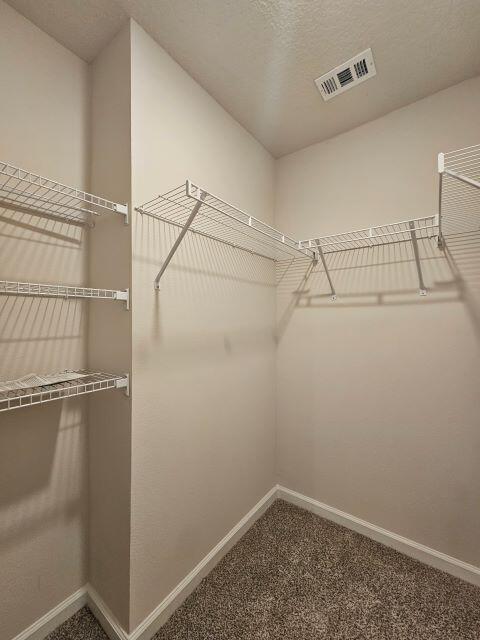 327 Flounder Street Crestview, FL 32539 - Photo 22 of 26 a view of a room with racks on the wall