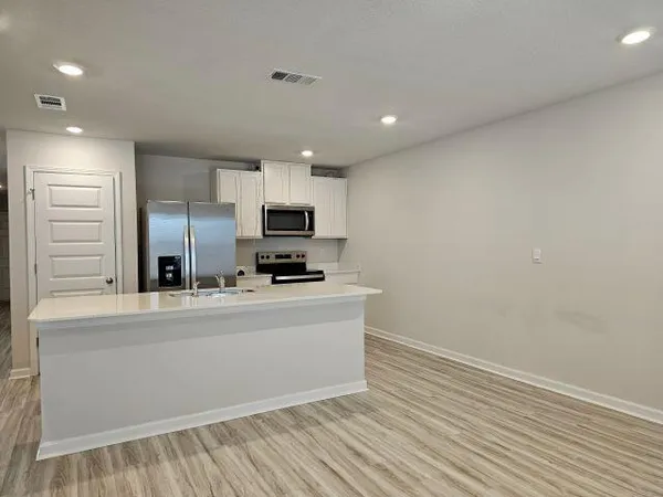 a view of a kitchen with electric equipment