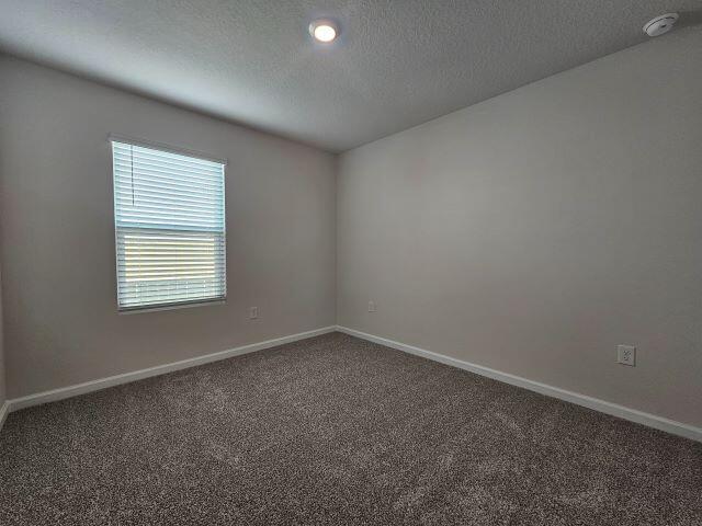 327 Flounder Street Crestview, FL 32539 - Photo 10 of 26 an empty room with a window