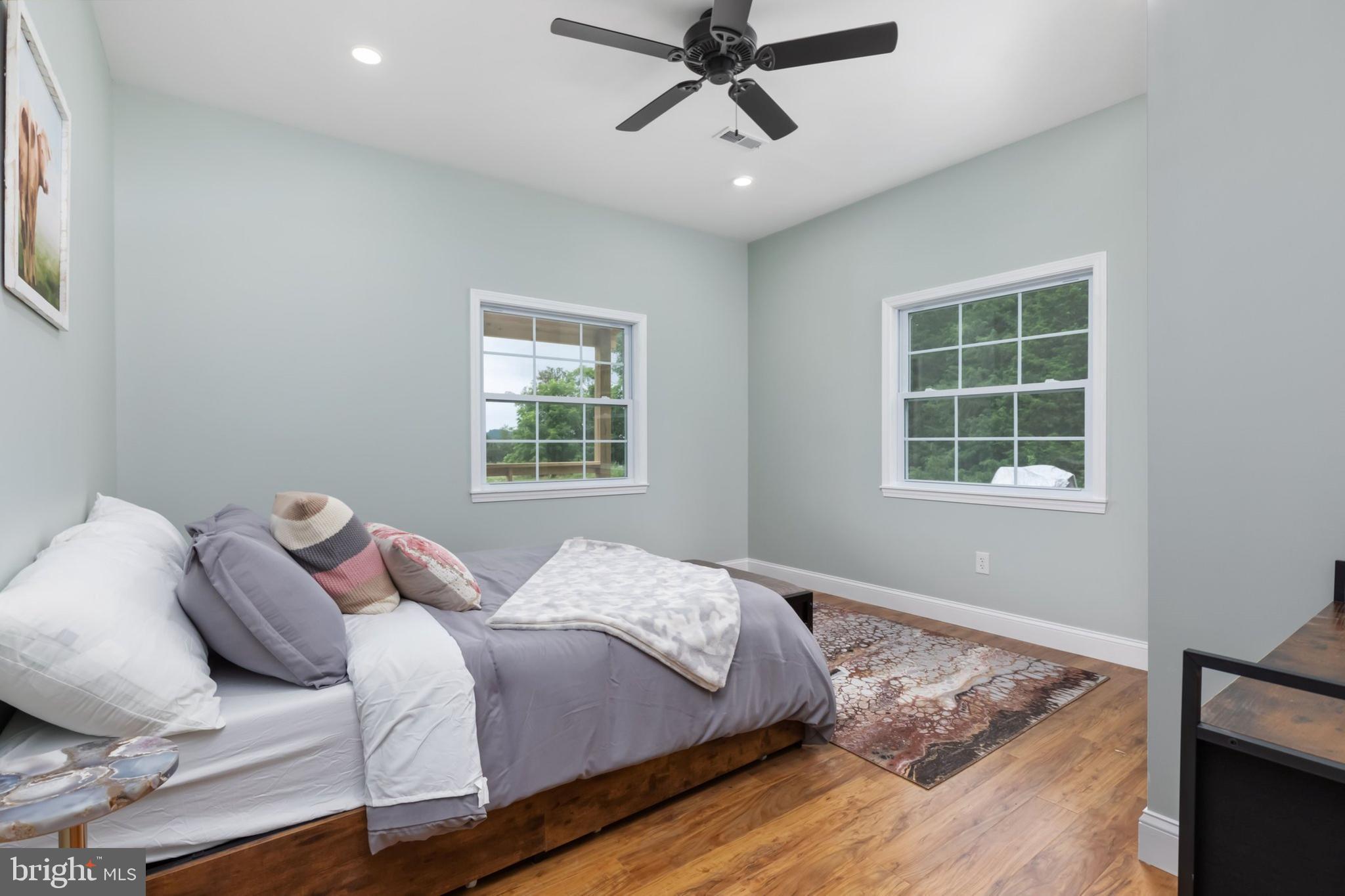 1195 Mountain View Drive Rileyville, VA 22650 - Photo 21 of 35 a bedroom with a bed and a window